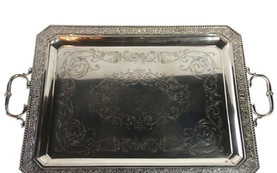 A large Hungarian silver two handled tray with scrolled frie...