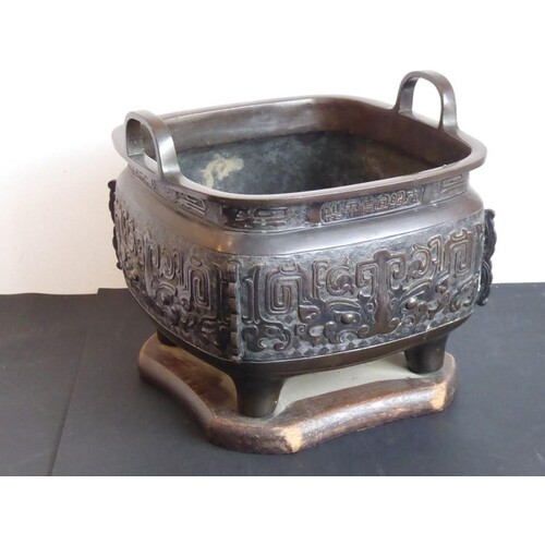 A large mid-19th century Japanese two-handled temple censer ...