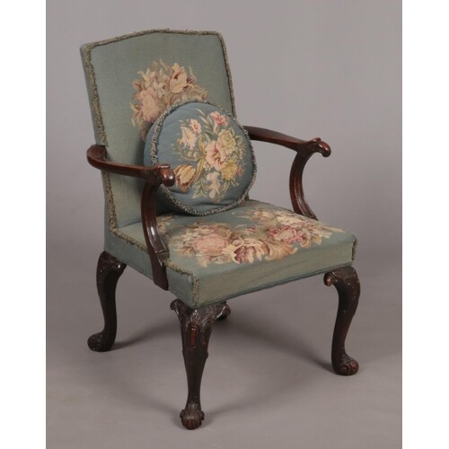 A mahogany Gainsborough type armchair in 18th century style....