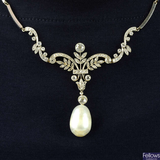 A natural pearl and vari-cut diamond scrolling foliate necklace.