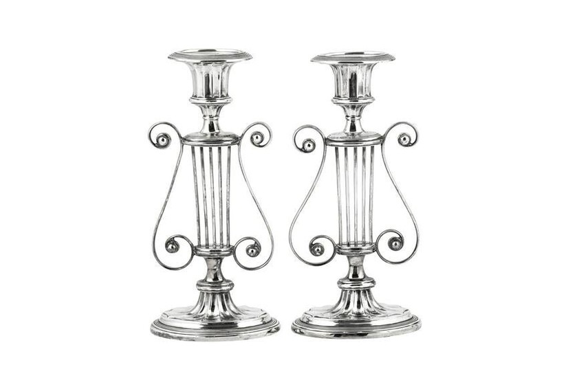 A pair of Edwardian sterling silver candlesticks