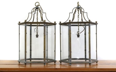 A pair of George III style hall brass lanterns