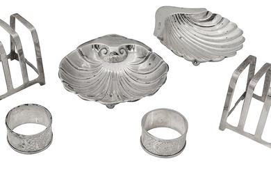 A pair of George VI Art Deco silver four division toast racks, two shell dishes and a pair of napkin