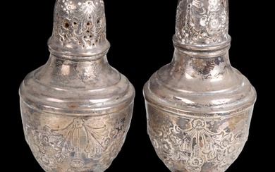 A pair of Victorian silver baluster pepperettes, Nathan & Ha...