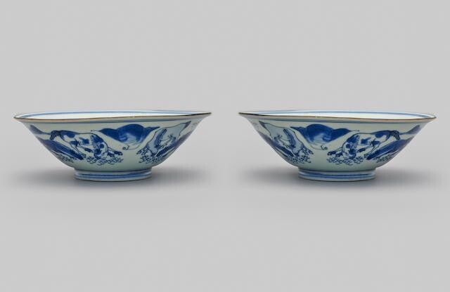 A pair of blue-and-white 'horse' conical bowls