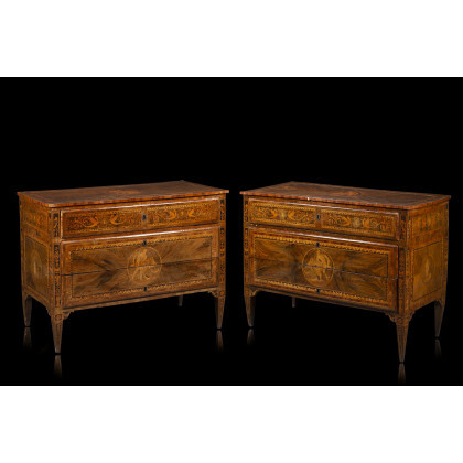 A pair of walnut burr veneered and inlaid commodes. Circle of Maggiolini, Lombardy, 18th century (cm 124x93x58) (defects)