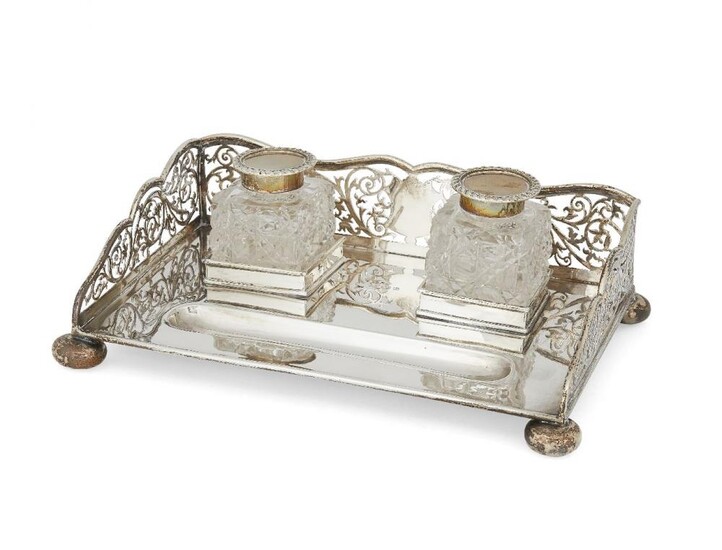 A pierced silver inkstand with squared cut...