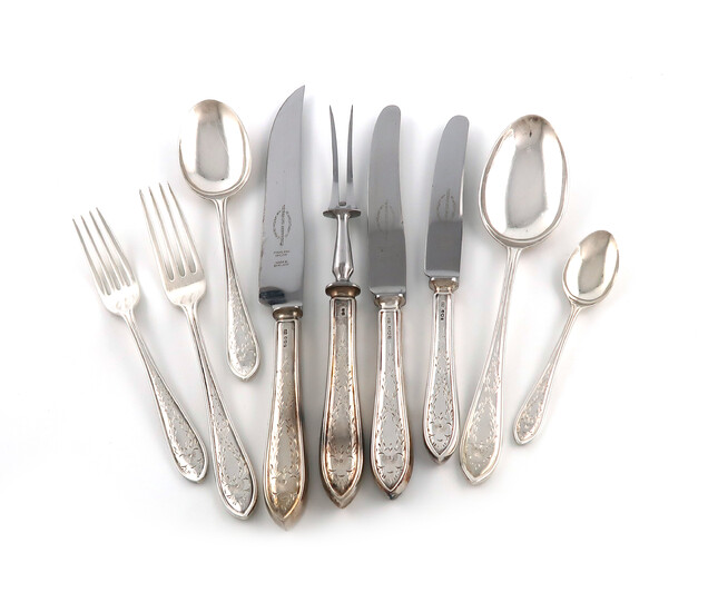 A silver canteen of engraved Sandringham pattern flatware for six