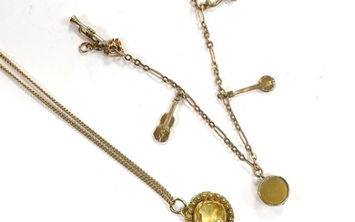 A small 9ct gold charm bracelet, hung with three assorted ch...