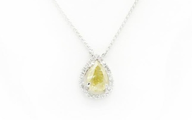 A white gold fancy yellow pear cut diamond pendant, †
