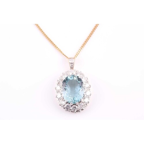 A yellow metal, diamond, and aquamarine pendant, set with a ...