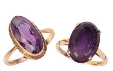 AN 18CT GOLD AMETHYST RING set with an oval cut amethyst, r...