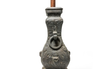 AN CHINESE ARCHAIC STYLE METAL VASE MOUNTED AS LAMP. 20TH CE...