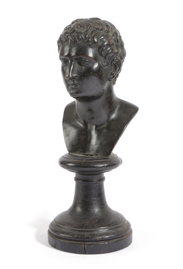 AN ITALIAN BRONZE GRAND TOUR BUST OF A YOUTH...