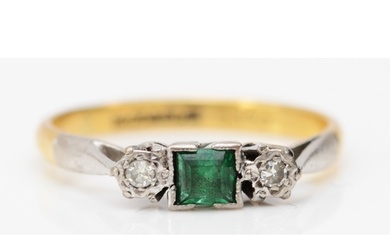 An 18ct gold emerald and diamond three stone ring, L, 2.5gm