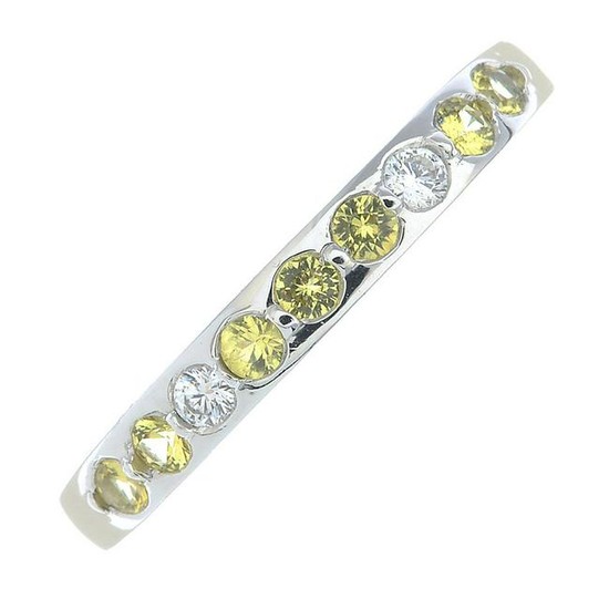 An 18ct gold yellow sapphire and brilliant-cut diamond
