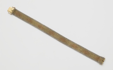 An 18k three colour gold Milanaise meshwork bracelet.