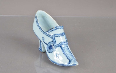 An 18th Century style blue and white Delftware shoe