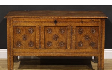 An 18th century oak blanket chest, hinged top enclosing a ti...