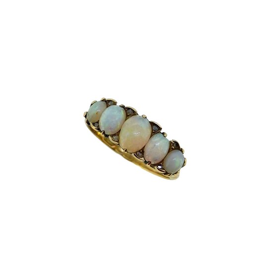 An Edwardian 18ct gold opal five stone ring
