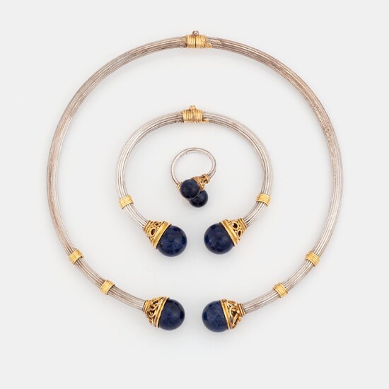 An Ilias Lalaounis demi parure comprising a necklace, a bracelet and a ring in silver and 18K gold set with sodalite