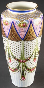 An art-nouveau porcelain vase with floral decor and guilding, imitation...