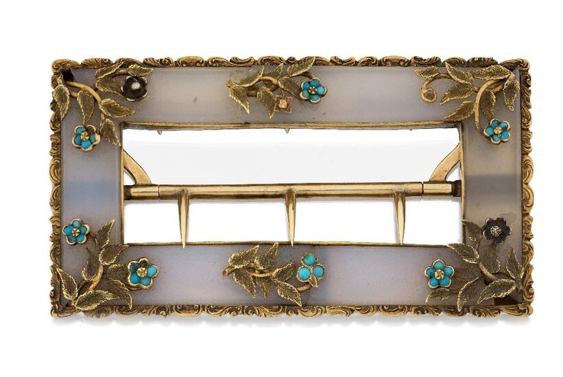 An early 19th century gold-mounted chalcedony buckle, the grey chalcedony frame with applied foliate and forget-me-not flower head decoration and repeated scroll border, c. 1840, approx. dimensions 4.2cm x 7.4cm