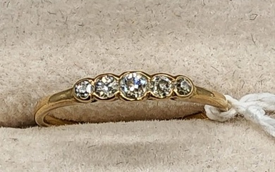 Antique 18ct yellow gold ring set with five various sized ro...