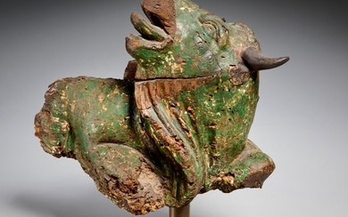 Antique polychrome wood carving of a bull