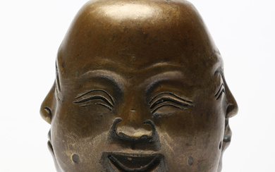 BRONZE SCULPTURE with four faces of Buddha.