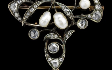 Broche Art nouveau sertie de perles baroques, dont une en pampille