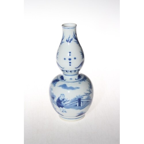 Chinese blue and white double gourd vase with outdoor figure...
