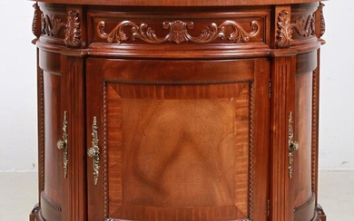 Continental style carved mahogany demilune commode