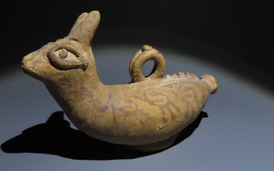 Cypriot Terracotta c. 7th century BC. Votive bull figure in the shape of an Askos. 16 cm L.