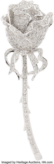 Diamond, White Gold Brooch The rose brooch features full-cut...