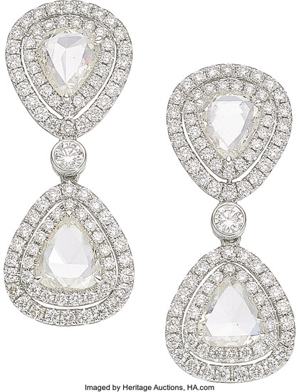 Diamond, White Gold Earrings The earrings feature pear-shaped rose-cut...