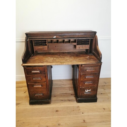 Early 20th C. oak roll top desk {118 cm H x 122 cm W x 68 cm...