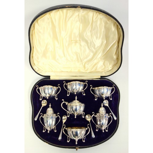 Fine Edwardian silver 12 piece cruet set of quatrefoil form,...