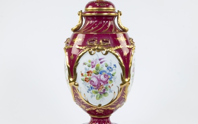 French porcelain lidded vase with gilt garlands and medallions with hand-painted floral decoration, marked