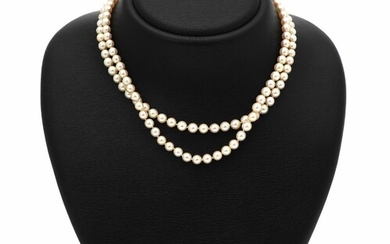 SOLD. Georg Jensen: A two strand pearl necklace of numerous cultured pearls and an amethyst and pearl clasp, mounted in 18k gold. – Bruun Rasmussen Auctioneers of Fine Art