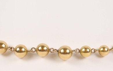 Gold-plated "balls" necklace. L : 48 cm