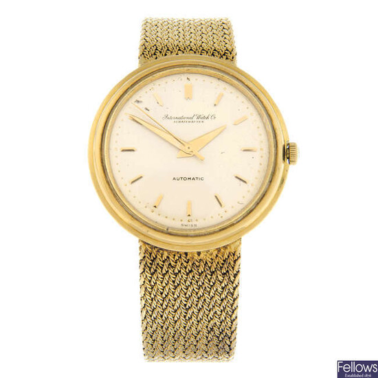 IWC - an 18ct yellow gold bracelet watch, 34.5mm.