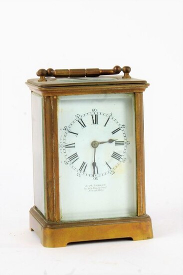 J.W. Benson, brass cased carriage clock, the white enamel dial with black roman numerals, (AF)