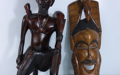 Large carved hardwood tribal figure and a tribal mask