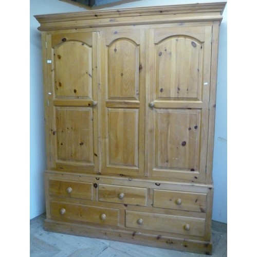 Large modern triple door pine wardrobe with three short and ...
