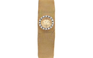 Omega. A lady's 18K gold diamond set manual wind bracelet watch Circa 1960