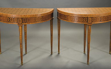 Pair of crescent-moon console tables in marquetry, ff. s. XIX. In fruit wood and stained. With a drawer in the waist and a green felt mat. Measurements: 74x44x87 cm. Exit: 750uros. (124.790 Ptas.)