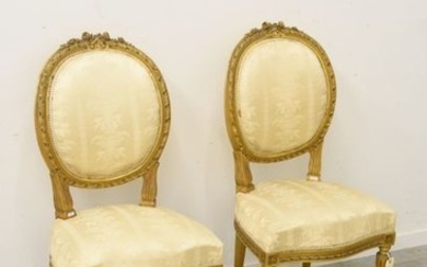 Pair of gilded Louis XVI style chairs
