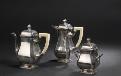Tea and coffee set in sterling silver with cut-off sides...