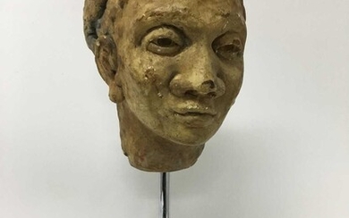 Plaster sculpture of a Nubian head, on stand